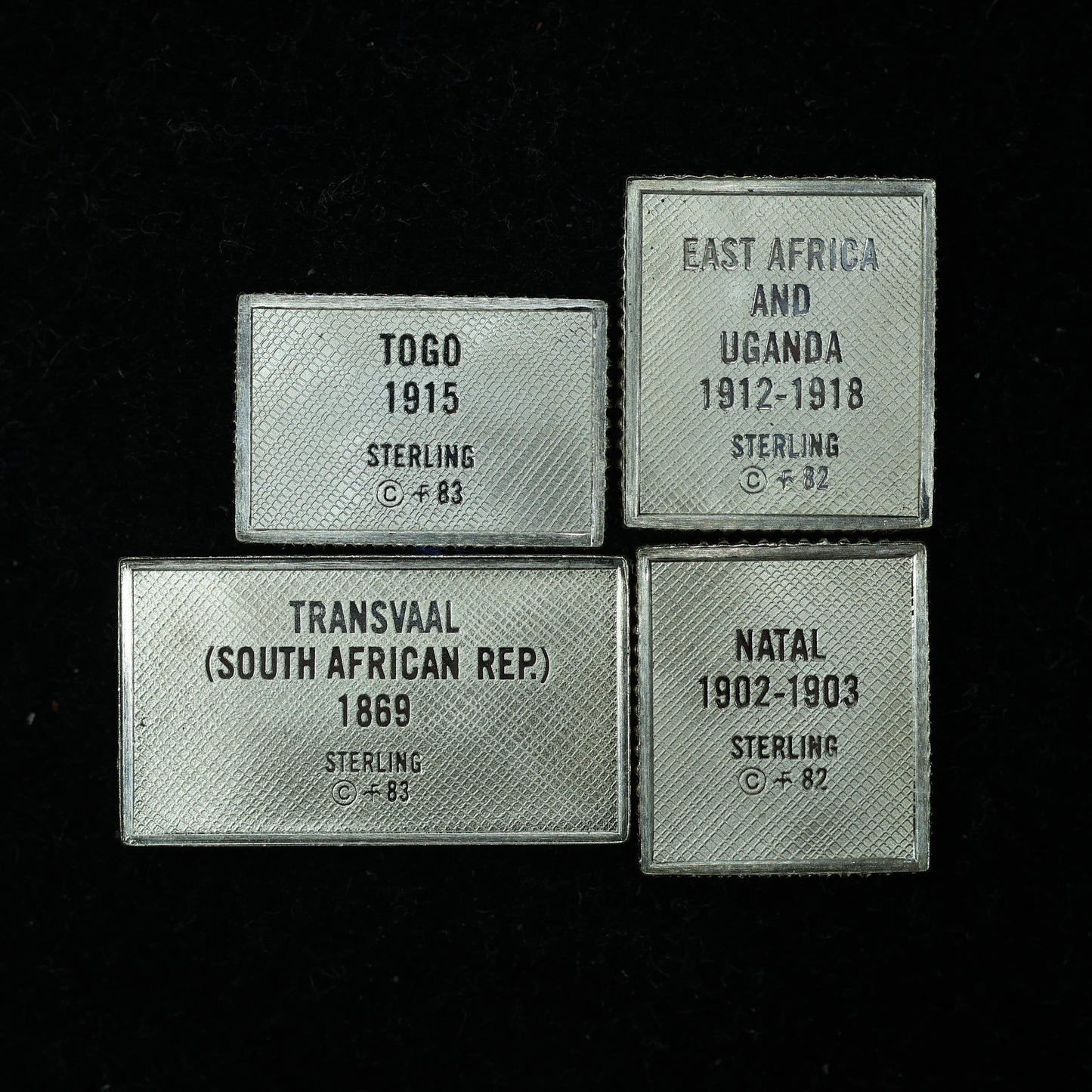 Franklin Mint Sterling Silver Miniature World Stamps - East Africa Natal Togo Transvaal