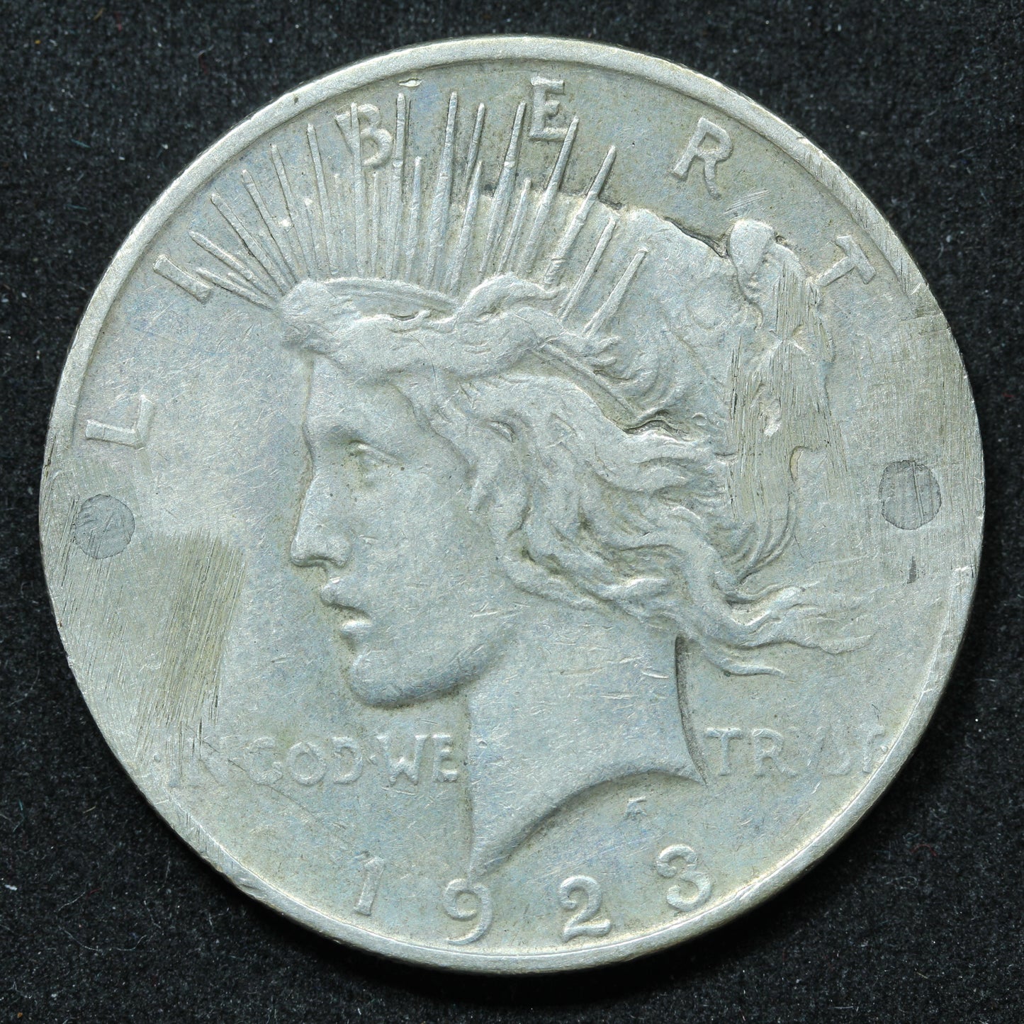 1923 D (Denver) Peace Silver Dollar - Damage