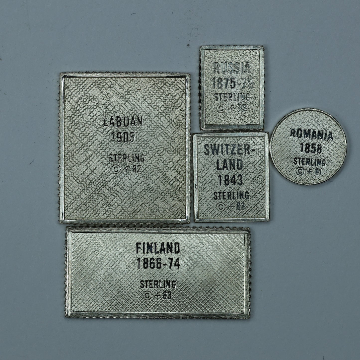Franklin Mint Sterling Silver Miniature World Stamps - Russia Romania Finland Switzerland Labuan