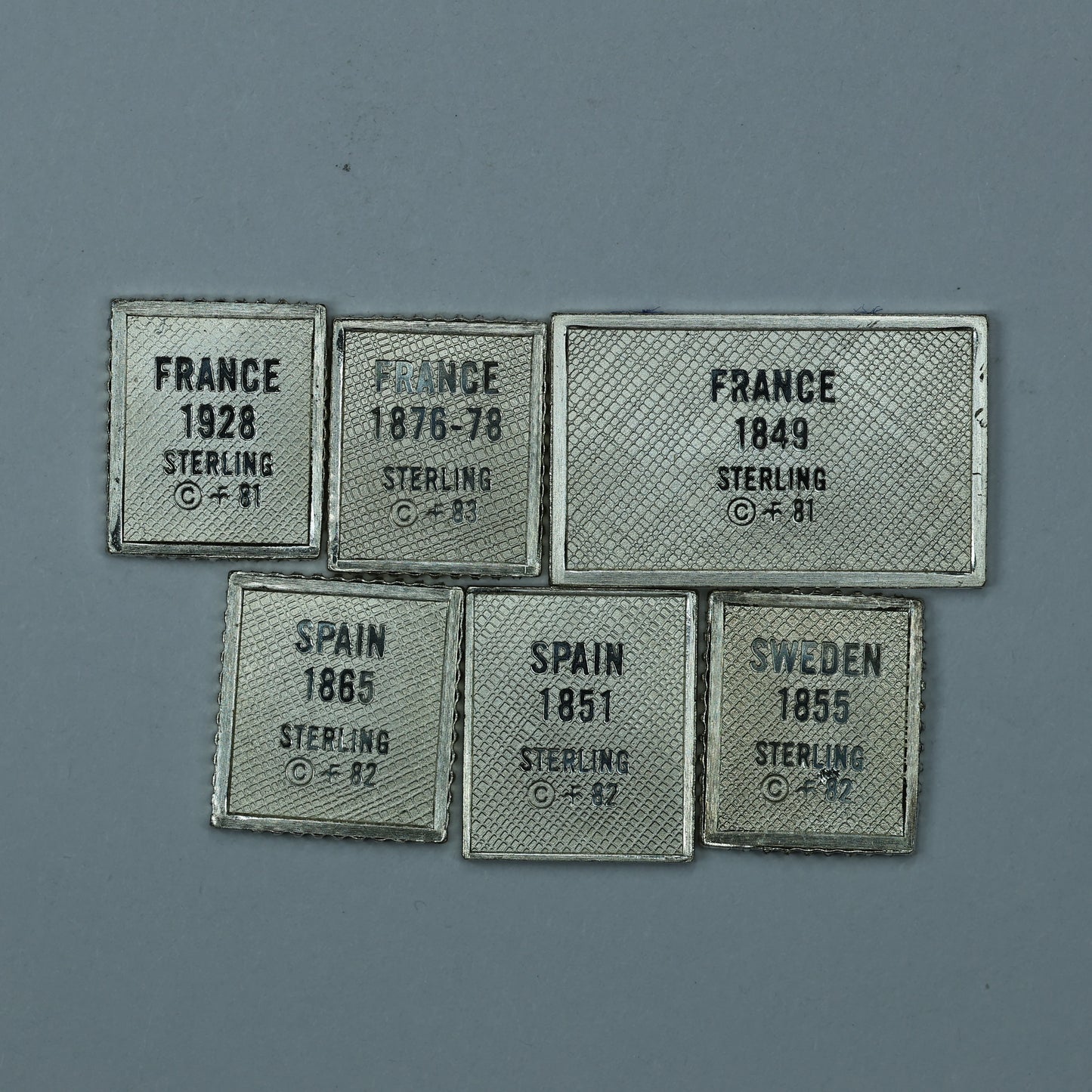 Franklin Mint Sterling Silver Miniature World Stamps - France Spain Sweden
