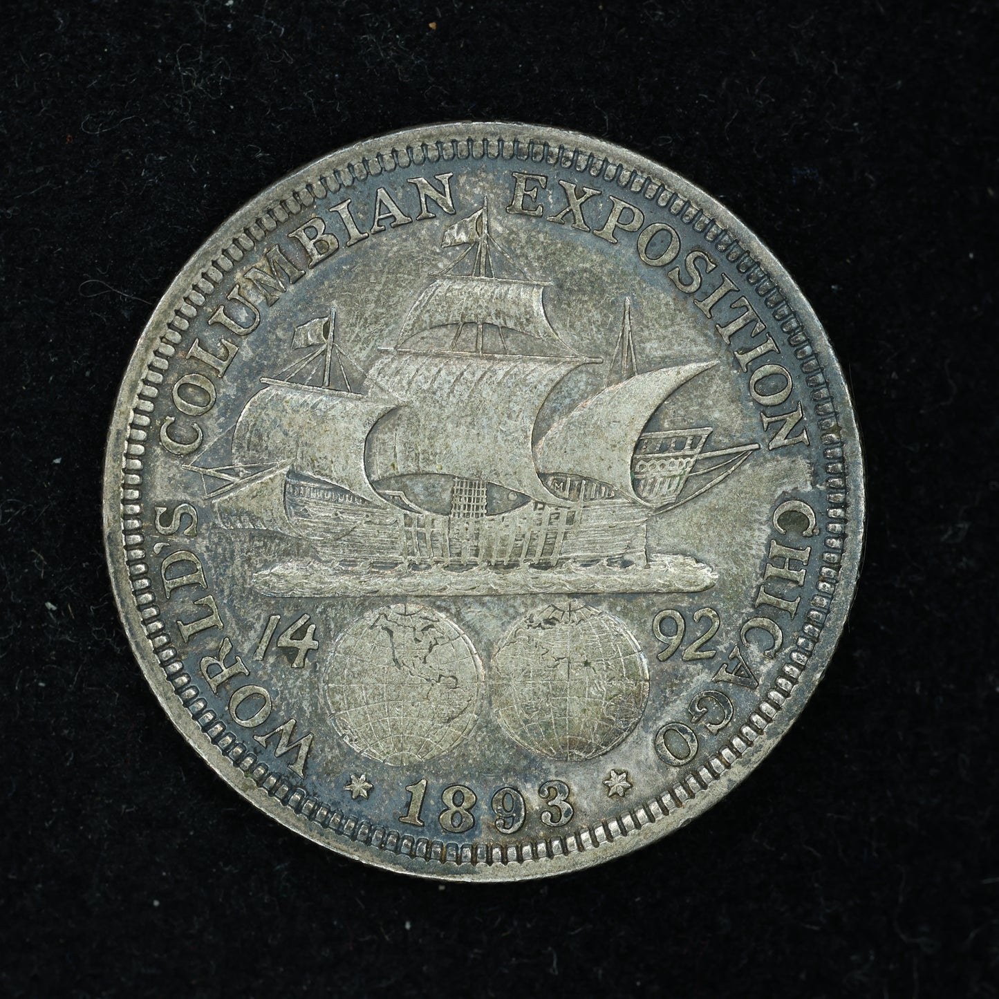 1893 Columbian Exposition Half Dollar reverse - Santa Maria over globes
