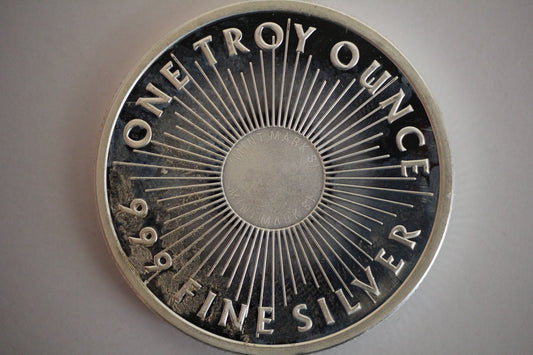 1 oz .999 Fine Silver Round - Sunshine Minting Eagle SI Mint Mark - Spots