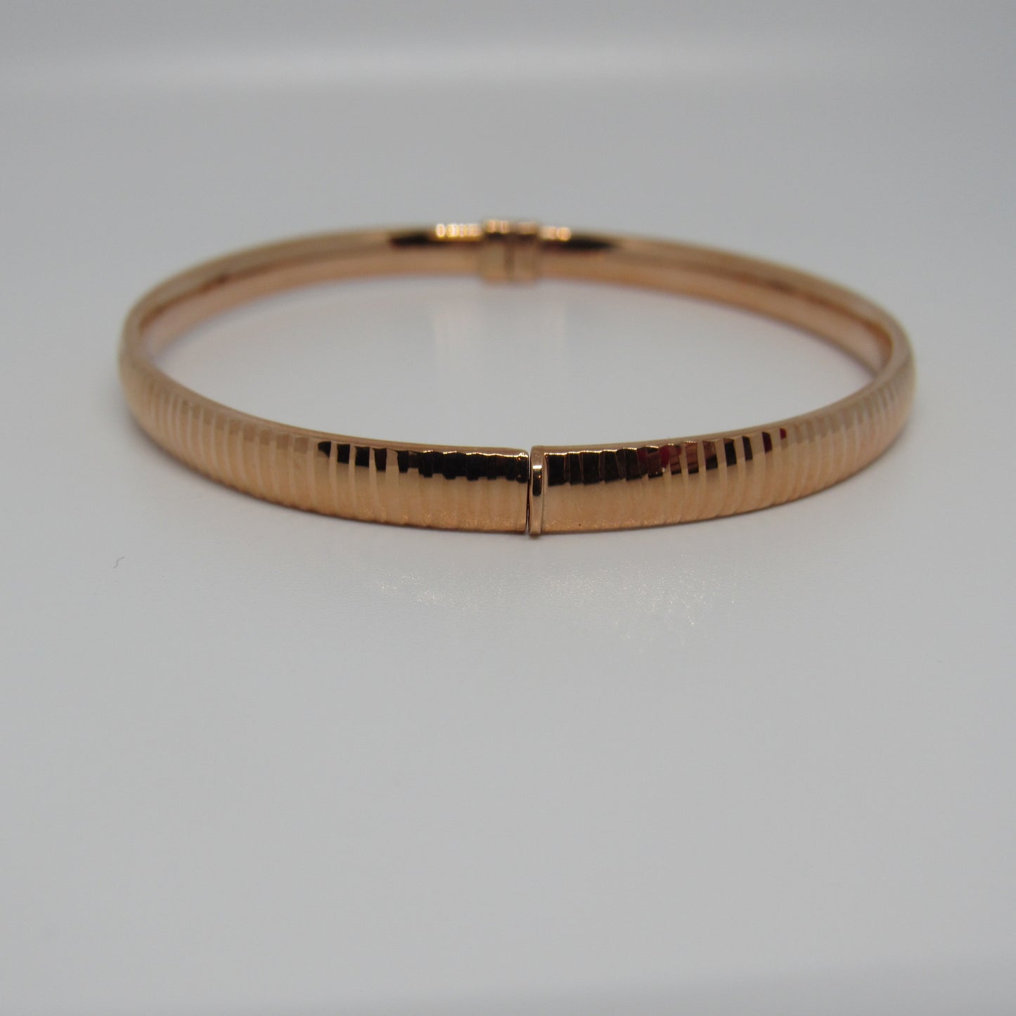 14K Rose Gold Turkey Ribbed Hinged Bangle Style Bracelet - 7.5 in