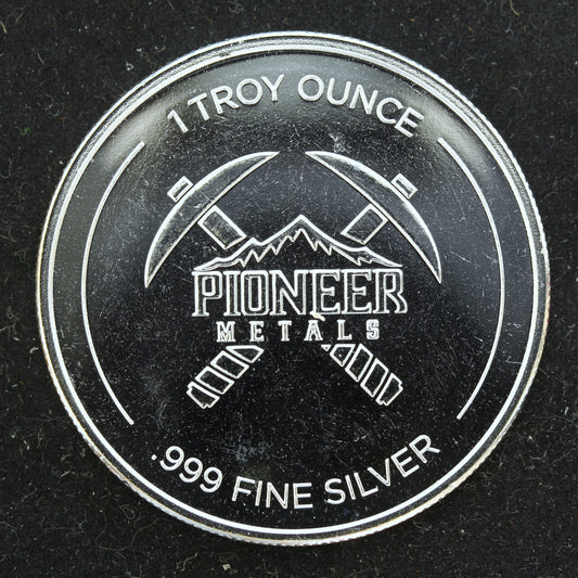 1 oz .999 Fine Silver Round - Pioneer Metals Pick Axe w/ Capsule