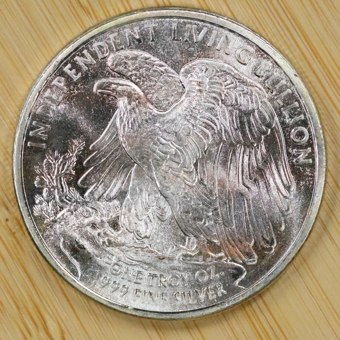 Independent Living 1 oz Silver Round - Walking Liberty Eagle Design - Spots