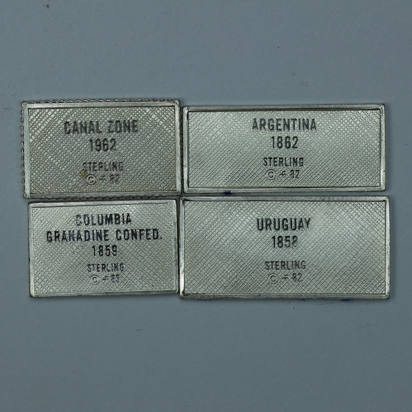 Franklin Mint Sterling Silver Miniature World Stamps - Canal Zone Argentina Uruguay Columbia
