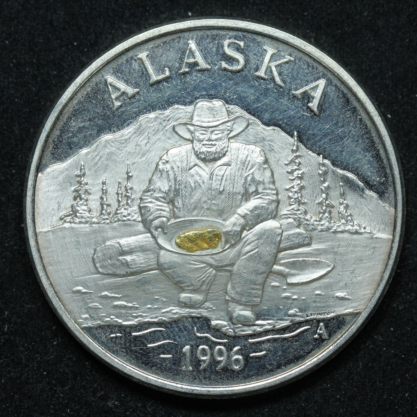1996 1 oz .999 Fine Silver - The Seal of The State of Alaska Prospector w/ Gold Nugget