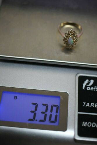 14k Yellow Gold Marquis Opal with Flower Like ~.25 cttw Diamond Halo - Size 6.5