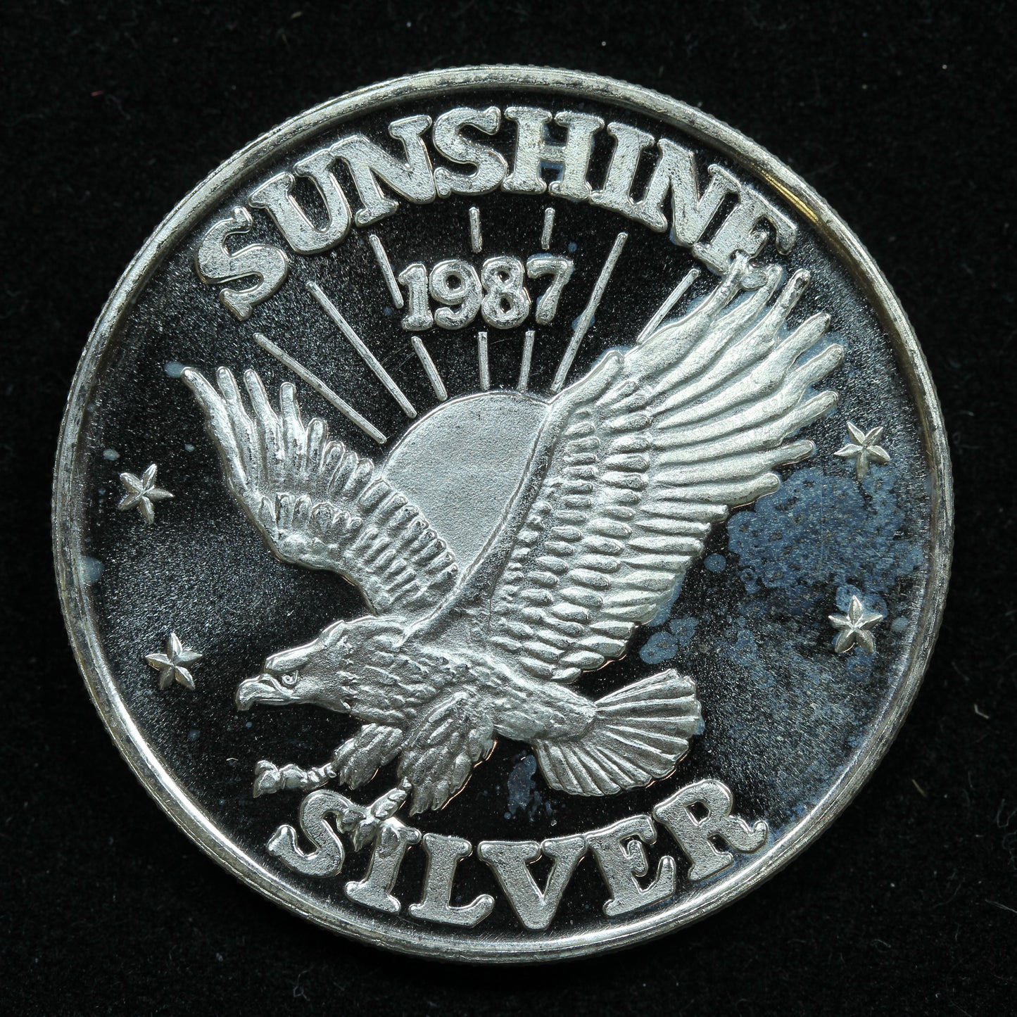 1/2 oz .999 Fine Silver Round - Sunshine Mining - 1987 Eagle - Spotted