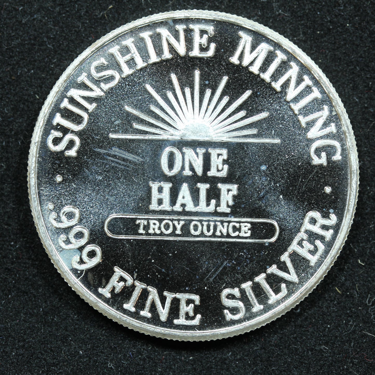 1/2 oz .999 Fine Silver Round - Sunshine Mining - 1987 Eagle - Spotted