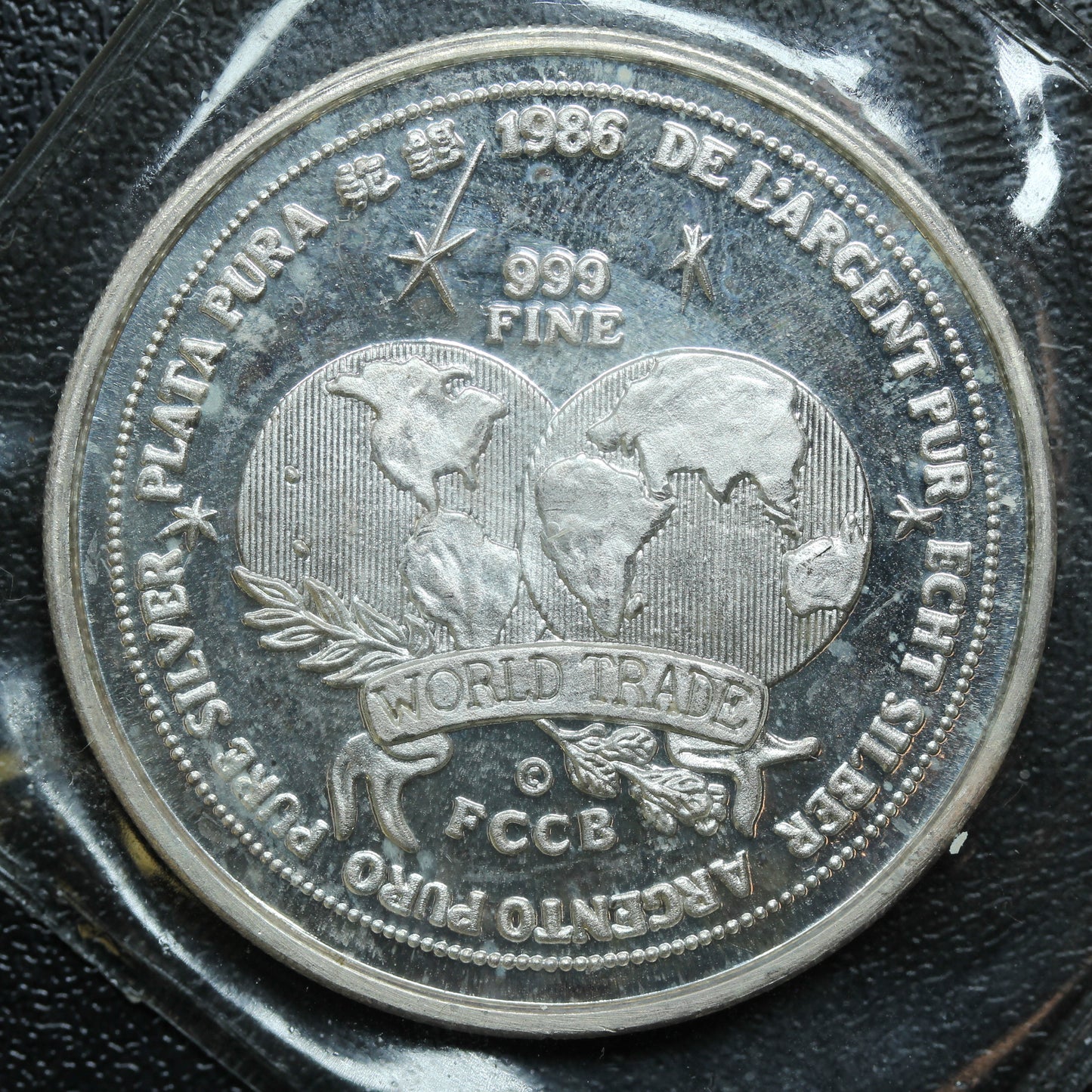 1986 World Trade Unit FCCB Plata Pura 1 oz .999 Silver Round - SEALED